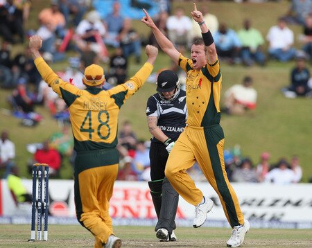 CENTURION, SOUTH AFRICA - OCTOBER 05:  Peter Siddle of Australia celebrates the wicket of Brendon McCullum of New Zealand as Michael Hussey of Australia runs into congratulate him during the ICC Champions Trophy Final between Australia and New Zealand played at Supersport Park on October 5, 2009 in Centurion, South Africa.  <br /><br /><span class="help">(Photo by Hamish Blair/Getty Images)</span>