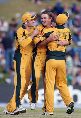 CENTURION, SOUTH AFRICA - OCTOBER 05:  Nathan Hauritz (C) of Australia is congratulated by team mates on the wicket of Martin Guptill of New Zealand during the ICC Champions Trophy Final between Australia and New Zealand played at Supersport Park on October 5, 2009 in Centurion, South Africa.  <br /><br /><span class="help">(Photo by Hamish Blair/Getty Images)</span>