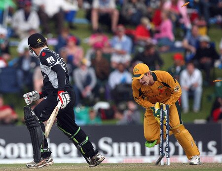 CENTURION, SOUTH AFRICA - OCTOBER 05:  Aaron Redmond of New Zealand is stumped by Tim Paine of Australia from the bowling of Nathan Hauritz of Australia during the ICC Champions Trophy Final between Australia and New Zealand played at Supersport Park on October 5, 2009 in Centurion, South Africa.  <br /><br /><span class="help">(Photo by Hamish Blair/Getty Images)</span>