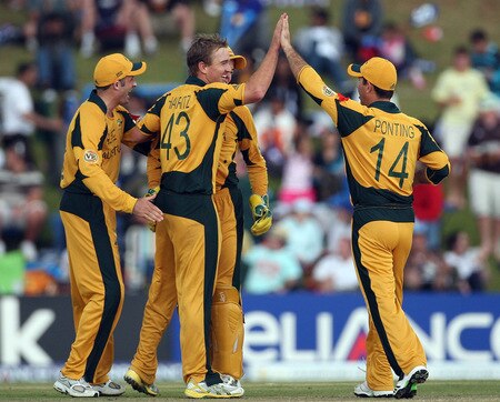 CENTURION, SOUTH AFRICA - OCTOBER 05:  Nathan Hauritz (C) of Australia is congratulated by team mates on the wicket of Aaron Redmond of New Zealand during the ICC Champions Trophy Final between Australia and New Zealand played at Supersport Park on October 5, 2009 in Centurion, South Africa.  <br /><br /><span class="help">(Photo by Hamish Blair/Getty Images)</span>