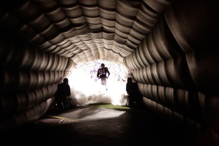 MINNEAPOLIS - OCTOBER 05:  Ray Edwards #91of the Minnesota Vikings runs onto the field through the tunnel prior to the start of game against the Green Bay Packers on October 5, 2009 at Hubert H. Humphrey Metrodome in Minneapolis, Minnesota.  <br /><br /><span class="help">(Photo by Jamie Squire/Getty Images)</span>