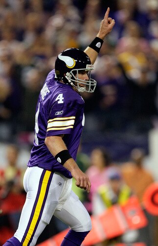 MINNEAPOLIS - OCTOBER 05:  Quarterback Brett Favre #4 of the Minnesota Vikings celebrates after a touchdown during the game against the Green Bay Packers on October 5, 2009 at Hubert H. Humphrey Metrodome in Minneapolis, Minnesota.  <br /><br /><span class="help">(Photo by Jamie Squire/Getty Images)</span>