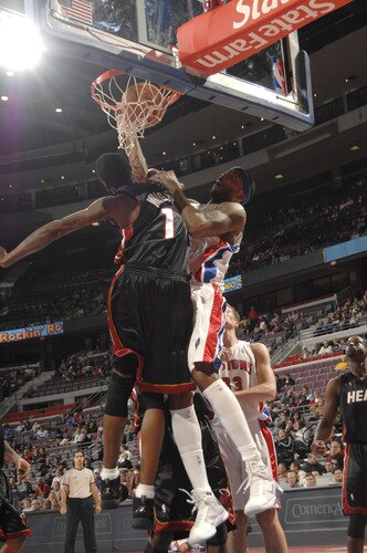 AUBURN HILLS, MI - OCTOBER 5:  Chris Wilcox #9 of the Detroit Pistons dunks against Dorell Wright #1 of the Miami Heat in a preseason game at the Palace of Auburn Hills on October 5, 2009 in Auburn Hills, Michigan.  <br /><br /><span class="help">(Photo by Allen Einstein/NBAE via Getty Images)</span>