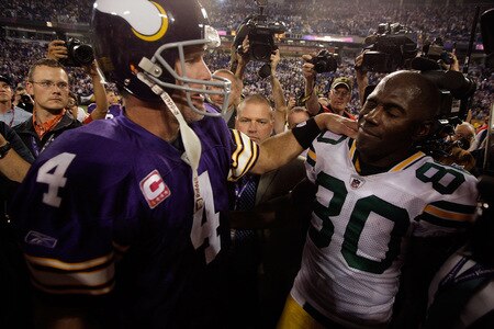 MINNEAPOLIS - OCTOBER 05:  Quarterback Brett Favre #4 of the Minnesota Vikings hugs former teammate Donald Driver #80 of the Green Bay Packers following the Vikings victory over the Packers on October 5, 2009 at Hubert H. Humphrey Metrodome in Minneapolis, Minnesota.  <br /><br /><span class="help">(Photo by Jamie Squire/Getty Images)</span>