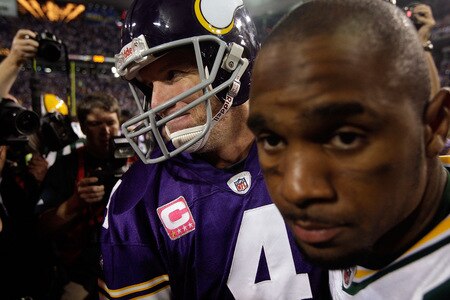 MINNEAPOLIS - OCTOBER 05:  Quarterback Brett Favre #4 of the Minnesota Vikings is congratulated by cornerback Charles Woodson #21 of the Green Bay Packers following the Vikings victory over the Packers on October 5, 2009 at Hubert H. Humphrey Metrodome in Minneapolis, Minnesota.  <br /><br /><span class="help">(Photo by Jamie Squire/Getty Images)</span>