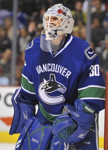 VANCOUVER, CANADA - OCTOBER 5: Andrew Raycroft #30 the Vancouver Canucks replacement goaltender yells instructions to his defense after replacing Roberto Luongo #1  in the third period of their game against the Columbus Blue Jackets at General Motors Place October 5, 2009 in Vancouver, Canada.   <br /><br /><span class="help">(Photo by Nick Didlick/Getty Images)</span>