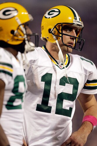 MINNEAPOLIS - OCTOBER 05:  Quarterback Aaron Rodgers #12 of the Green Bay Packers walks off the field during the Monday Night Football game against the Minnesota Vikings on October 5, 2009 at Hubert H. Humphrey Metrodome in Minneapolis, Minnesota.  <br /><br /><span class="help">(Photo by Jamie Squire/Getty Images)</span>