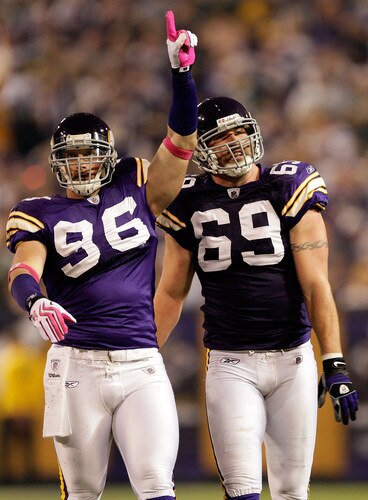 MINNEAPOLIS - OCTOBER 05:  Defensive ends Brian Robinson #96 and Jared Allen #69 of the Minnesota Vikings celebrate during the Monday Night Football game against the Green Bay Packers on October 5, 2009 at Hubert H. Humphrey Metrodome in Minneapolis, Minnesota.  <br /><br /><span class="help">(Photo by Jamie Squire/Getty Images)</span>