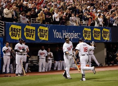 MINNEAPOLIS - OCTOBER 06:  Jason Kubel #16 of the Minnesota Twins is congratulated by teammates after hitting a home run against starting pitcher Rick Porcello # 48 of the Detroit Tigers during the 6th inning of the American League Tiebreaker game on October 6, 2009 at Hubert H. Humphrey Metrodome in Minneapolis, Minnesota.  <br /><br /><span class="help">(Photo by Jamie Squire/Getty Images)</span>