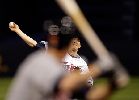 MINNEAPOLIS - OCTOBER 06:  Starting pitcher Scott Baker #30 of the Minnesota Twins pitches during the American League Tiebreaker game against the Detroit Tigers on October 6, 2009 at Hubert H. Humphrey Metrodome in Minneapolis, Minnesota.  <br /><br /><span class="help">(Photo by Jamie Squire/Getty Images)</span>