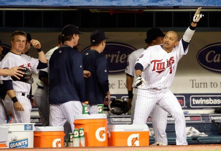 MINNEAPOLIS - OCTOBER 06:  Orlando Cabrera #18 of the Minnesota Twins waves to the crowd after hitting  a home run off the Detroit Tigers during the 7th inning of the American League Tiebreaker game on October 6, 2009 at Hubert H. Humphrey Metrodome in Minneapolis, Minnesota.  <br /><br /><span class="help">(Photo by Jamie Squire/Getty Images)</span>