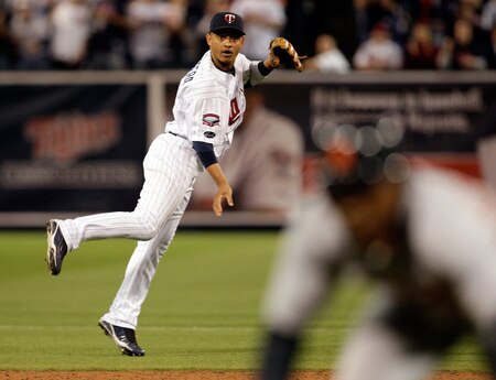 MINNEAPOLIS - OCTOBER 06:  Shortstop Orlando Cabrera #18 of the Minnesota Twins lturns a double play during the 9th inningof the American League Tiebreaker game against the Detroit Tigers on October 6, 2009 at Hubert H. Humphrey Metrodome in Minneapolis, Minnesota.  <br /><br /><span class="help">(Photo by Jamie Squire/Getty Images)</span>