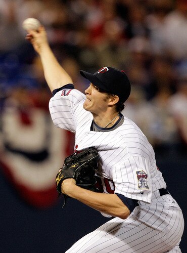 MINNEAPOLIS - OCTOBER 06:  Starting pitcher Scott Baker #30 of the Minnesota Twins pitches during the American League Tiebreaker game against the Detroit Tigers on October 6, 2009 at Hubert H. Humphrey Metrodome in Minneapolis, Minnesota.  <br /><br /><span class="help">(Photo by Jamie Squire/Getty Images)</span>
