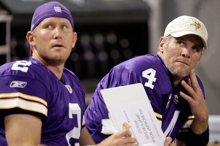 MINNEAPOLIS - OCTOBER 05:  Quarterbacks Brett Favre #4 and Sage Rosenfels #2 of the Minnesota Vikings watch the scoreboard from the bench during the Monday Night Football game against the Green Bay Packers on October 5, 2009 at Hubert H. Humphrey Metrodome in Minneapolis, Minnesota.  <br /><br /><span class="help">(Photo by Jamie Squire/Getty Images)</span>