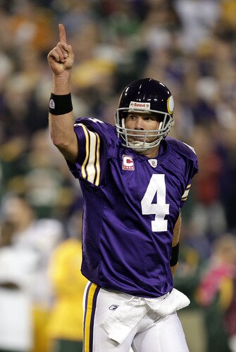 MINNEAPOLIS - OCTOBER 05:  Quarterback Brett Favre #4 of the Minnesota Vikings celebrates after a touchdown during the game against the Green Bay Packers on October 5, 2009 at Hubert H. Humphrey Metrodome in Minneapolis, Minnesota.  <br /><br /><span class="help">(Photo by Jamie Squire/Getty Images)</span>