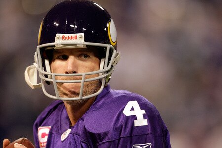 MINNEAPOLIS - OCTOBER 05:  Quarterback Brett Favre #4 of the Minnesota Vikings warms up prior to the start of the game against the Green Bay Packers on October 5, 2009 at Hubert H. Humphrey Metrodome in Minneapolis, Minnesota.  <br /><br /><span class="help">(Photo by Jamie Squire/Getty Images)</span>