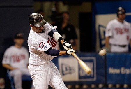 MINNEAPOLIS - OCTOBER 06:  Orlando Cabrera #18 of the Minnesota Twins hits a home run off the Detroit Tigers during the 7th inning of the American League Tiebreaker game on October 6, 2009 at Hubert H. Humphrey Metrodome in Minneapolis, Minnesota.  <br /><br /><span class="help">(Photo by Jamie Squire/Getty Images)</span>