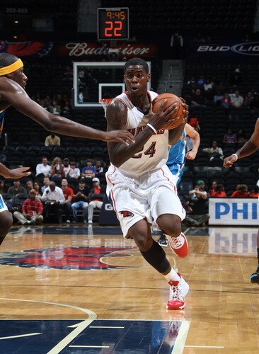 ATLANTA - OCTOBER 7: Marvin Williams #24 of the Atlanta Hawks drives to the basket against the New Orleans Hornets during a preseason game on October 7, 2009 at Philips Arena in Atlanta, Georgia.  <br /><br /><span class="help">(Photo by Scott Cunningham/NBAE via Getty Images)</span>