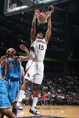 ATLANTA - OCTOBER 7: Al Horford #15 of the Atlanta Hawks dunks against the New Orleans Hornets during a preseason game on October 7, 2009 at Philips Arena in Atlanta, Georgia.  <br /><br /><span class="help">(Photo by Scott Cunningham/NBAE via Getty Images)</span>