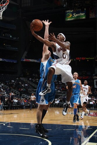 ATLANTA - OCTOBER 7: Jeff Teague #0 of the Atlanta Hawks puts up a shot against the New Orleans Hornets during a preseason game on October 7, 2009 at Philips Arena in Atlanta, Georgia.  <br /><br /><span class="help">(Photo by Scott Cunningham/NBAE via Getty Images)</span>