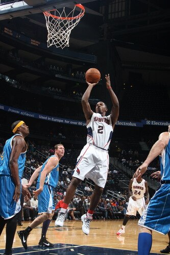 ATLANTA - OCTOBER 7: Joe Johnson #2 of the Atlanta Hawks puts up a shot against the New Orleans Hornets during a preseason game on October 7, 2009 at Philips Arena in Atlanta, Georgia.  <br /><br /><span class="help">(Photo by Scott Cunningham/NBAE via Getty Images)</span>