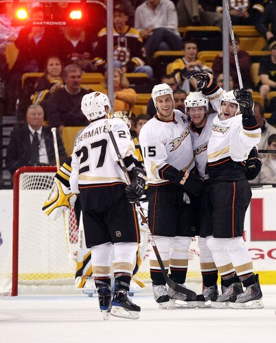 BOSTON - OCTOBER 08:  Bobby Ryan #9 of the Anaheim Ducks celebrates his goal with teammates Ryan Getzlaf #15, Corey Perry #10 and Scott Niedermayer #27 in the third period against the Boston Bruins on October 8, 2009 at the TD Garden in Boston, Massachusetts. The Ducks defeated the Bruins 6-1.  <br /><br /><span class="help">(Photo by Elsa/Getty Images)</span>