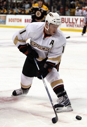 BOSTON - OCTOBER 08:  Saku Koivu #11 of the Anaheim Ducks passes the puck against  the Boston Bruins on October 8, 2009 at the TD Garden in Boston, Massachusetts. The Ducks defeated the Bruins 6-1.  <br /><br /><span class="help">(Photo by Elsa/Getty Images)</span>