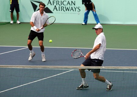 TOKYO - OCTOBER 09: Frantisek Cermak of the Czech Republic and Michal Mertinak of Slovakia returns a shot in their doubles match against Christopher Kas of Germany and Jaroslav Levinsky of the Czech Republic during day five of the Rakuten Open Tennis tournament at Ariake Colosseum on October 9, 2009 in Tokyo, Japan.  <br /><br /><span class="help">(Photo by Koji Watanabe/Getty Images)</span>