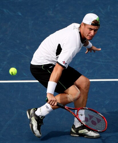 TOKYO - OCTOBER 09:  Lleyton Hewitt of Australia plays a backhand in his match against Edouard Roger-Vasselin of France during day five of the Rakuten Open Tennis tournament at Ariake Colosseum on October 9, 2009 in Tokyo, Japan.  <br /><br /><span class="help">(Photo by Koichi Kamoshida/Getty Images)</span>