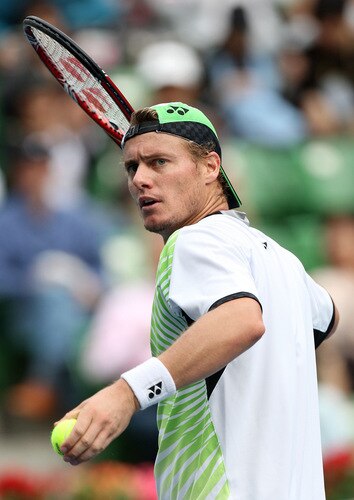 TOKYO - OCTOBER 09:  Lleyton Hewitt of Australia gives out signed balls to the audience after playing his match against Edouard Roger-Vasselin of France during day five of the Rakuten Open Tennis tournament at Ariake Colosseum on October 9, 2009 in Tokyo, Japan.  <br /><br /><span class="help">(Photo by Junko Kimura/Getty Images)</span>
