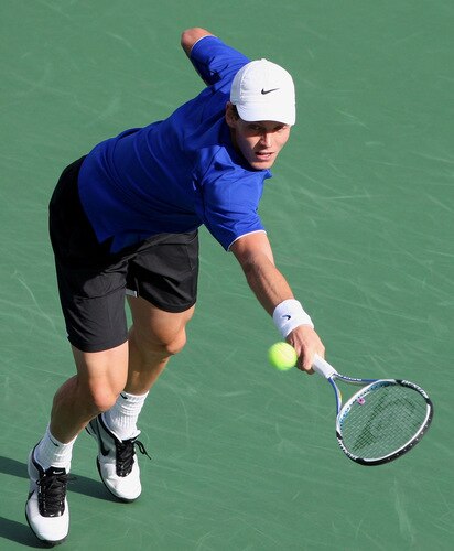 TOKYO - OCTOBER 09:  Tomas Berdych of the Czech Republic plays a backhand in his match against Mikhail Youzhny of Russia during day five of the Rakuten Open Tennis tournament at Ariake Colosseum on October 9, 2009 in Tokyo, Japan.  <br /><br /><span class="help">(Photo by Koichi Kamoshida/Getty Images)</span>
