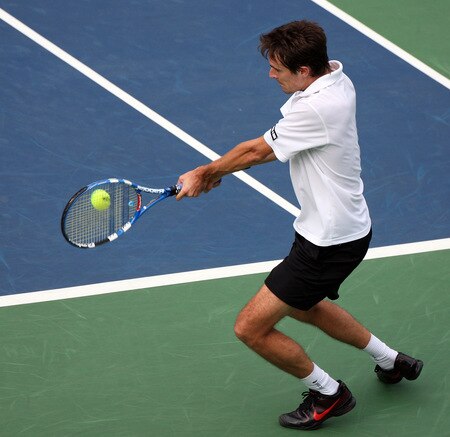 TOKYO - OCTOBER 09:  Edouard Roger-Vasselin of France plays a backhand in his match against Lleyton Hewitt of Australia during day five of the Rakuten Open Tennis tournament at Ariake Colosseum on October 9, 2009 in Tokyo, Japan.  <br /><br /><span class="help">(Photo by Koichi Kamoshida/Getty Images)</span>