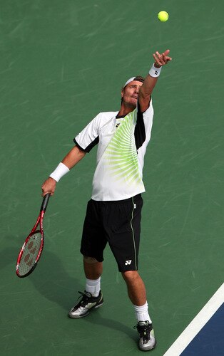 TOKYO - OCTOBER 09:  Lleyton Hewitt of Australia serves in his match against Edouard Roger-Vasselin of France during day five of the Rakuten Open Tennis tournament at Ariake Colosseum on October 9, 2009 in Tokyo, Japan.  <br /><br /><span class="help">(Photo by Koichi Kamoshida/Getty Images)</span>