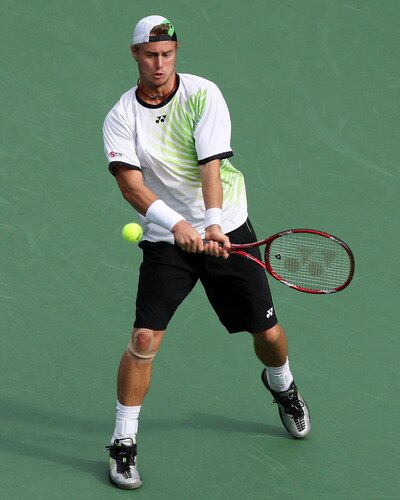 TOKYO - OCTOBER 09:  Lleyton Hewitt of Australia plays a backhand in his match against Edouard Roger-Vasselin of France during day five of the Rakuten Open Tennis tournament at Ariake Colosseum on October 9, 2009 in Tokyo, Japan.  <br /><br /><span class="help">(Photo by Junko Kimura/Getty Images)</span>