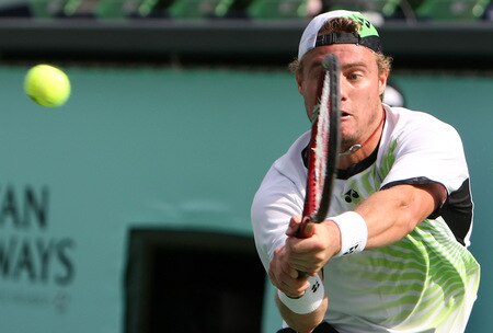 TOKYO - OCTOBER 09:  Lleyton Hewitt of plays a backhand in his match against Edouard Roger-Vasselin of France during day five of the Rakuten Open Tennis tournament at Ariake Colosseum on October 9, 2009 in Tokyo, Japan.  <br /><br /><span class="help">(Photo by Junko Kimura/Getty Images)</span>
