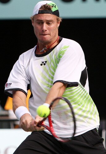 TOKYO - OCTOBER 09:  Lleyton Hewitt of plays a backhand in his match against Edouard Roger-Vasselin of France during day five of the Rakuten Open Tennis tournament at Ariake Colosseum on October 9, 2009 in Tokyo, Japan.  <br /><br /><span class="help">(Photo by Junko Kimura/Getty Images)</span>