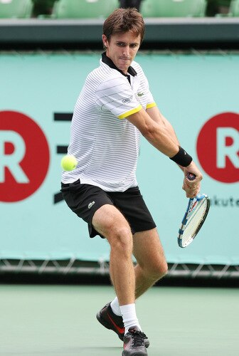 TOKYO - OCTOBER 09:  Edouard Roger-Vasselin of France plays a backhand in his match against Lleyton Hewitt of Australia during day five of the Rakuten Open Tennis tournament at Ariake Colosseum on October 9, 2009 in Tokyo, Japan.  <br /><br /><span class="help">(Photo by Junko Kimura/Getty Images)</span>
