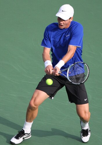 TOKYO - OCTOBER 09:  Tomas Berdych of the Czech Republic plays a backhand in his match against Mikhail Youzhny of Russia during day five of the Rakuten Open Tennis tournament at Ariake Colosseum on October 9, 2009 in Tokyo, Japan.  <br /><br /><span class="help">(Photo by Koichi Kamoshida/Getty Images)</span>