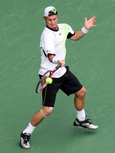 TOKYO - OCTOBER 09:  Lleyton Hewitt of Australia plays a forehand in his match against Edouard Roger-Vasselin of France during day five of the Rakuten Open Tennis tournament at Ariake Colosseum on October 9, 2009 in Tokyo, Japan.  <br /><br /><span class="help">(Photo by Junko Kimura/Getty Images)</span>
