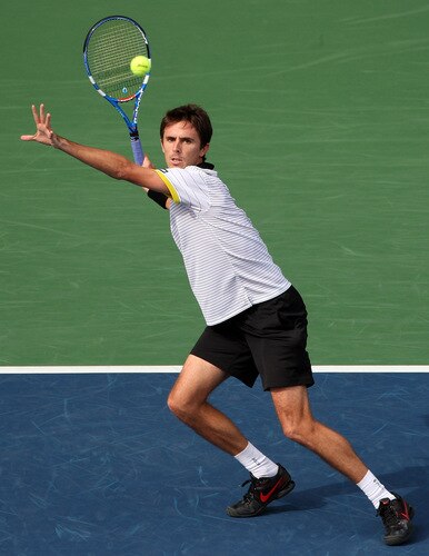 TOKYO - OCTOBER 09:  Edouard Roger-Vasselin of France plays a forehand in his match against Lleyton Hewitt of Australia during day five of the Rakuten Open Tennis tournament at Ariake Colosseum on October 9, 2009 in Tokyo, Japan.  <br /><br /><span class="help">(Photo by Koichi Kamoshida/Getty Images)</span>