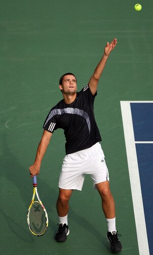 TOKYO - OCTOBER 09:  Mikhail Youzhny of Russia serves in his match against Tomas Berdych of the Czech Republic during day five of the Rakuten Open Tennis tournament at Ariake Colosseum on October 9, 2009 in Tokyo, Japan.  <br /><br /><span class="help">(Photo by Koichi Kamoshida/Getty Images)</span>