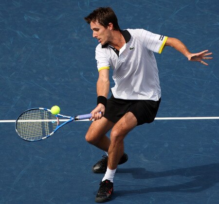 TOKYO - OCTOBER 09:  Edouard Roger-Vasselin of France plays a forehand in his match against Lleyton Hewitt of Australia during day five of the Rakuten Open Tennis tournament at Ariake Colosseum on October 9, 2009 in Tokyo, Japan.  <br /><br /><span class="help">(Photo by Koichi Kamoshida/Getty Images)</span>
