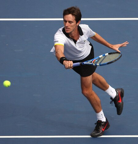 TOKYO - OCTOBER 09:  Edouard Roger-Vasselin of France plays a backhand in his match against Lleyton Hewitt of Australia during day five of the Rakuten Open Tennis tournament at Ariake Colosseum on October 9, 2009 in Tokyo, Japan.  <br /><br /><span class="help">(Photo by Koichi Kamoshida/Getty Images)</span>