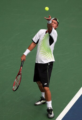 TOKYO - OCTOBER 09:  Lleyton Hewitt of Australia serves in his match against Edouard Roger-Vasselin of France during day five of the Rakuten Open Tennis tournament at Ariake Colosseum on October 9, 2009 in Tokyo, Japan.  <br /><br /><span class="help">(Photo by Koichi Kamoshida/Getty Images)</span>