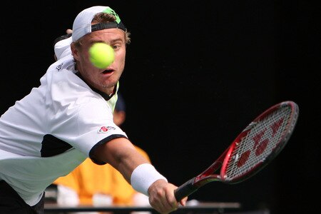 TOKYO - OCTOBER 09:  Lleyton Hewitt of plays a backhand in his match against Edouard Roger-Vasselin of France during day five of the Rakuten Open Tennis tournament at Ariake Colosseum on October 9, 2009 in Tokyo, Japan.  <br /><br /><span class="help">(Photo by Junko Kimura/Getty Images)</span>