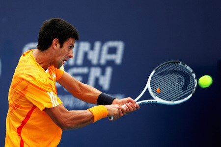 BEIJING - OCTOBER 09:  Novak Djokovic of Serbia returns a shot against Fernando Verdasco of Spain in the quarter-finals during day eight of the 2009 China Open at the National Tennis Centre on October 9, 2009 in Beijing, China.  <br /><br /><span class="help">(Photo by Feng Li/Getty Images)</span>