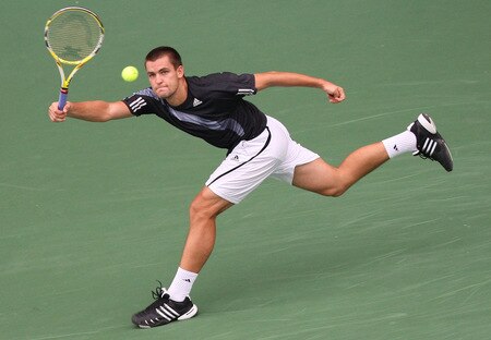 TOKYO - OCTOBER 09:  Mikhail Youzhny of Russia plays a forehand in his match against Tomas Berdych of the Czech Republic during day five of the Rakuten Open Tennis tournament at Ariake Colosseum on October 9, 2009 in Tokyo, Japan.  <br /><br /><span class="help">(Photo by Junko Kimura/Getty Images)</span>