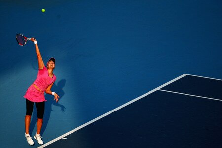 BEIJING - OCTOBER 09:  Nadia Petrova of Russia returns a shot against Peng Shuai of China in the quarter-finals during day eight of the 2009 China Open at the National Tennis Centre on October 9, 2009 in Beijing, China.  <br /><br /><span class="help">(Photo by Feng Li/Getty Images)</span>
