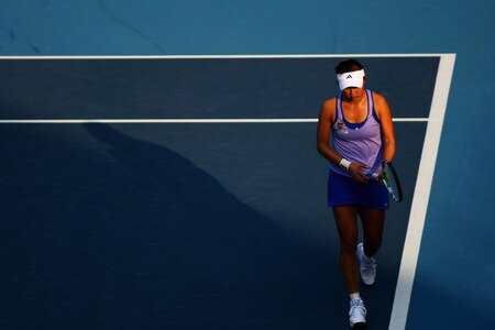BEIJING - OCTOBER 09:  Peng Shuai of China misses a shot against Nadia Petrova of Russia  in the quarter-finals during day eight of the 2009 China Open at the National Tennis Centre on October 9, 2009 in Beijing, China.  <br /><br /><span class="help">(Photo by Feng Li/Getty Images)</span>