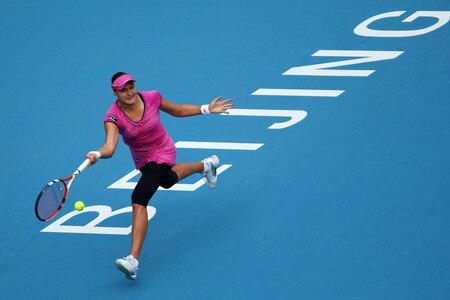 BEIJING - OCTOBER 09:  Nadia Petrova of Russia returns a shot against Peng Shuai of China in the quarter-finals during day eight of the 2009 China Open at the National Tennis Centre on October 9, 2009 in Beijing, China.  <br /><br /><span class="help">(Photo by Feng Li/Getty Images)</span>